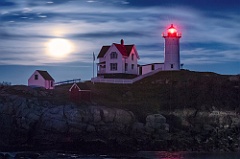 Moon Rising at Twilight at Nubble Lighthouse in Maine